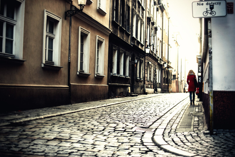 side street red coat woman ryenk winter sunrise.jpg